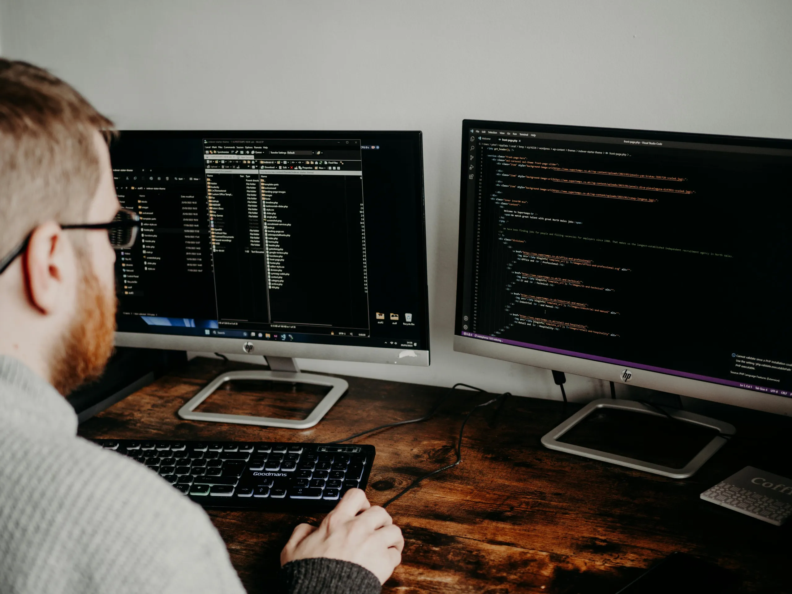 Developer reviewing legacy code on a laptop